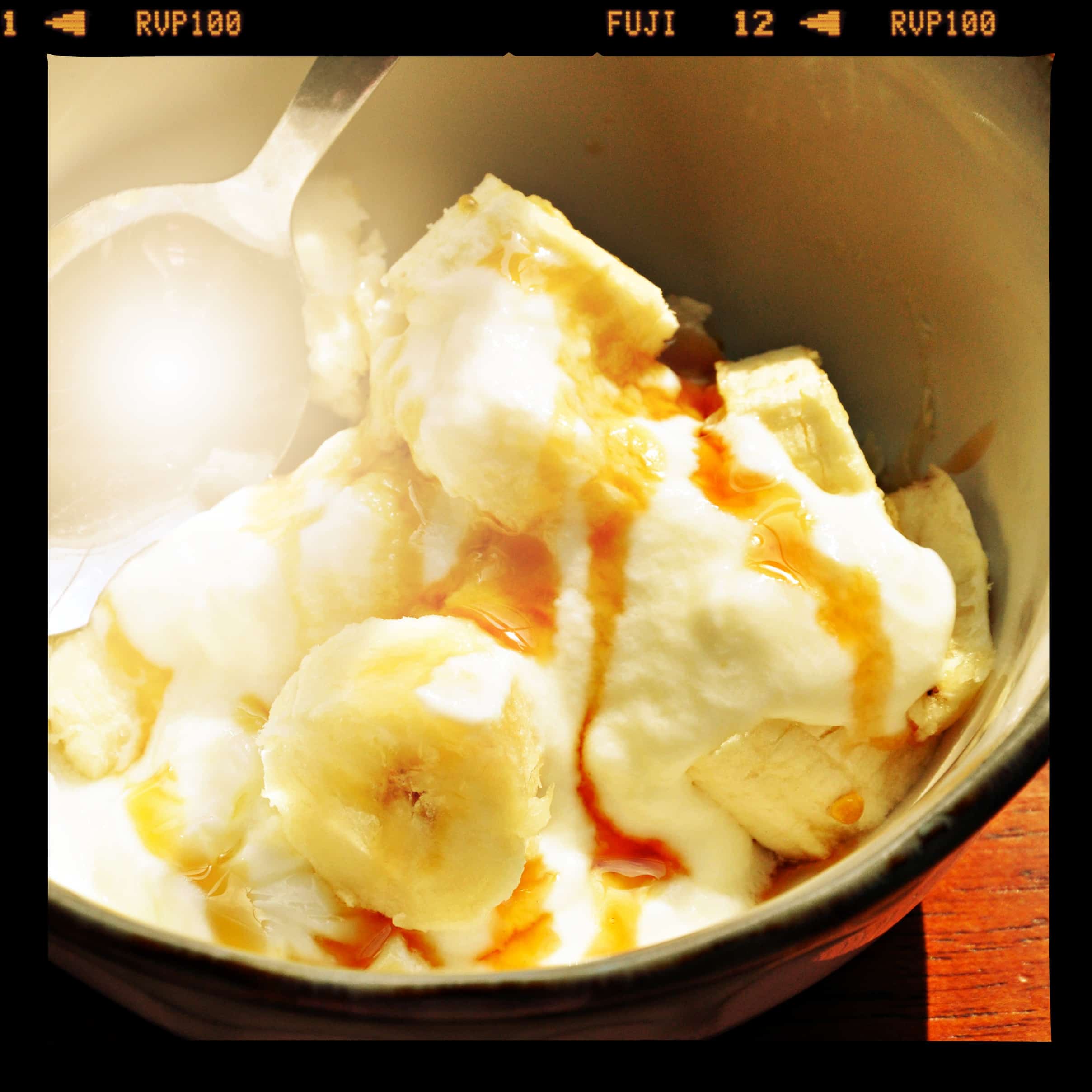 4 quick gluten free banana breakfast ideas from knowgluten.me - bananas with organic yogurt and raw honey with sunburst filter and film frame
