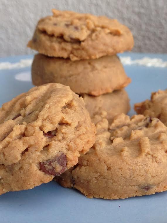 a closeup of gluten free peanut butter shortbread cookies on a blue plate.