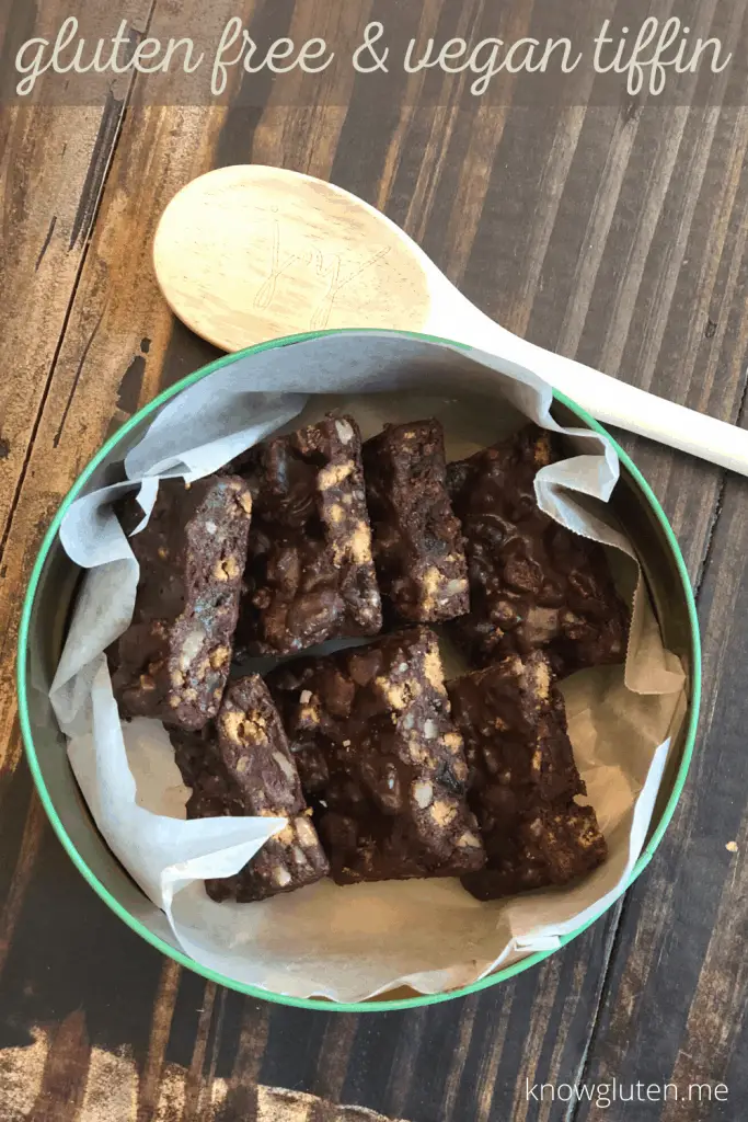 pieces of gluten free & vegan tiffin arranged in a cookie tin