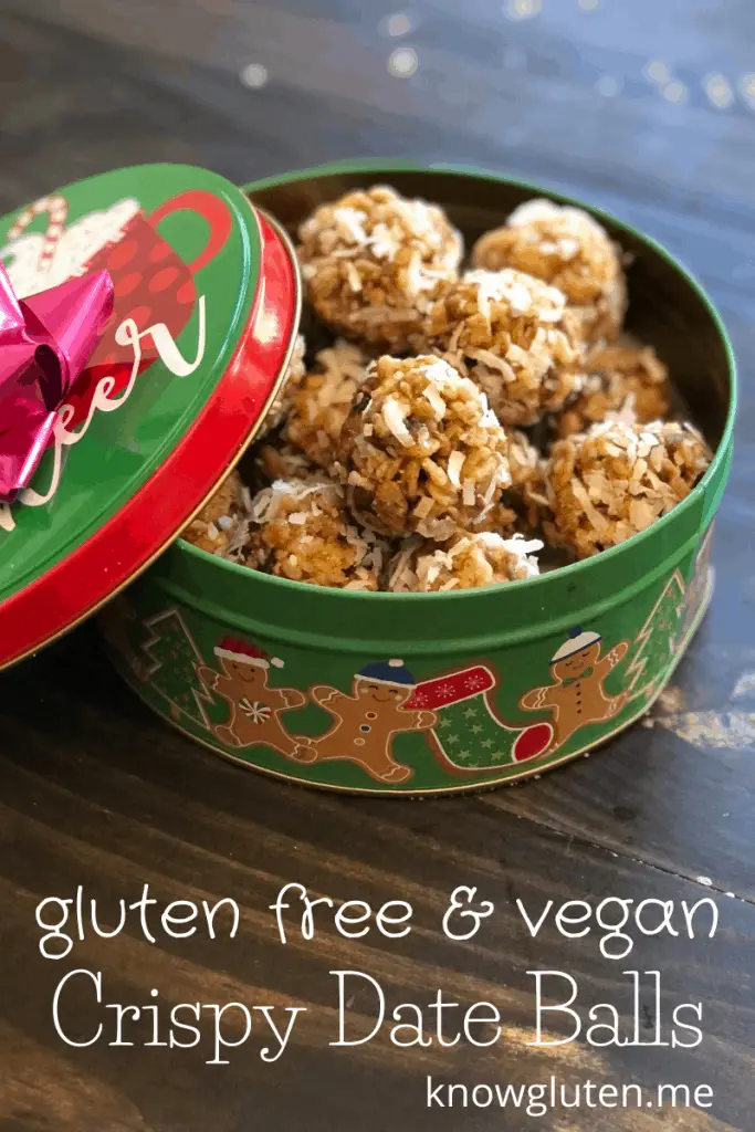 gluten free and vegan crispy date balls in a dessert tin with a bow on the lid