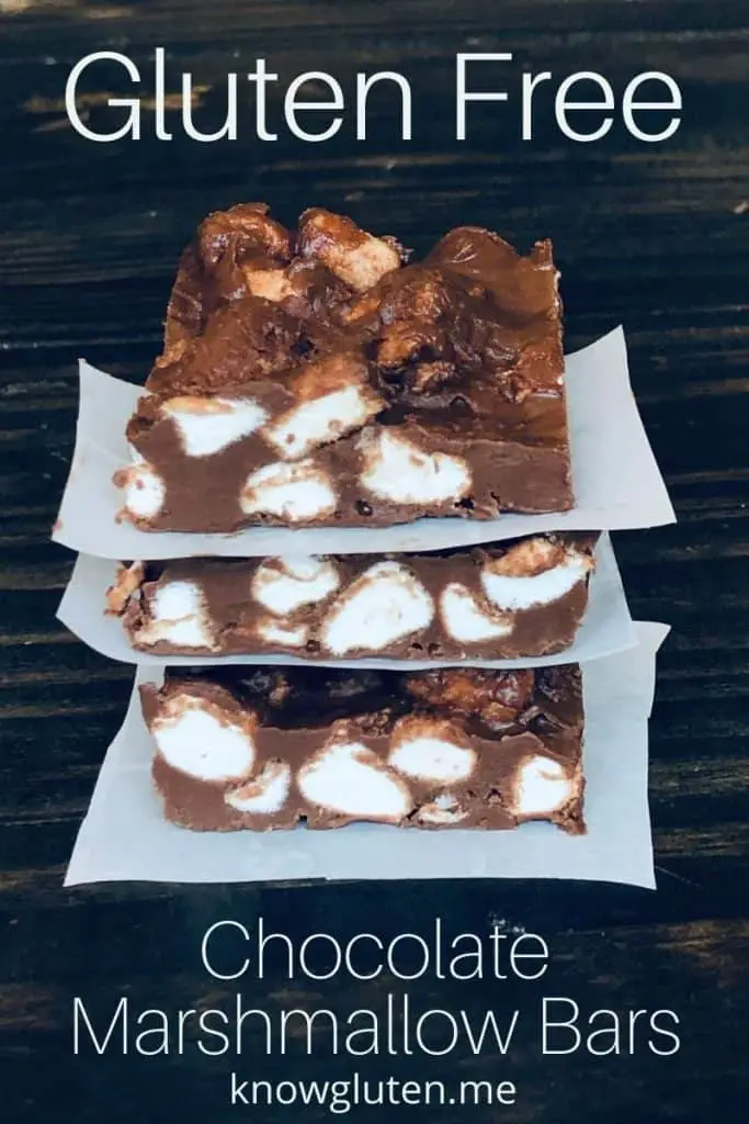 A closeup of a stack of chocolate marshmallow bars.
