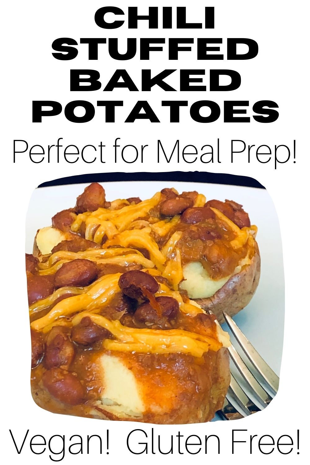 Gluten Free Chili Stuffed Potatoes on a white plate with fork.