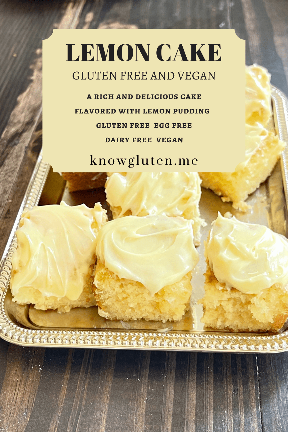 An overhead view of a tray of gluten free lemon cake cut into squares.